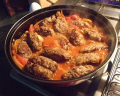 Beef and rice croquettes with tomato onion gravy
