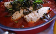 White fish baked in tomato and caper sauce