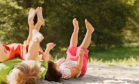 kids with their feet in the air