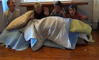 kids with pillow fort