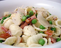 Ear pasta with peas and bacon
