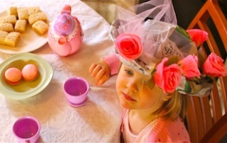 Newspaper tea party hats on Kidspot