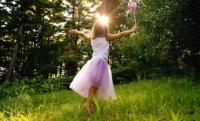 Girl dancing in fairy princess costume