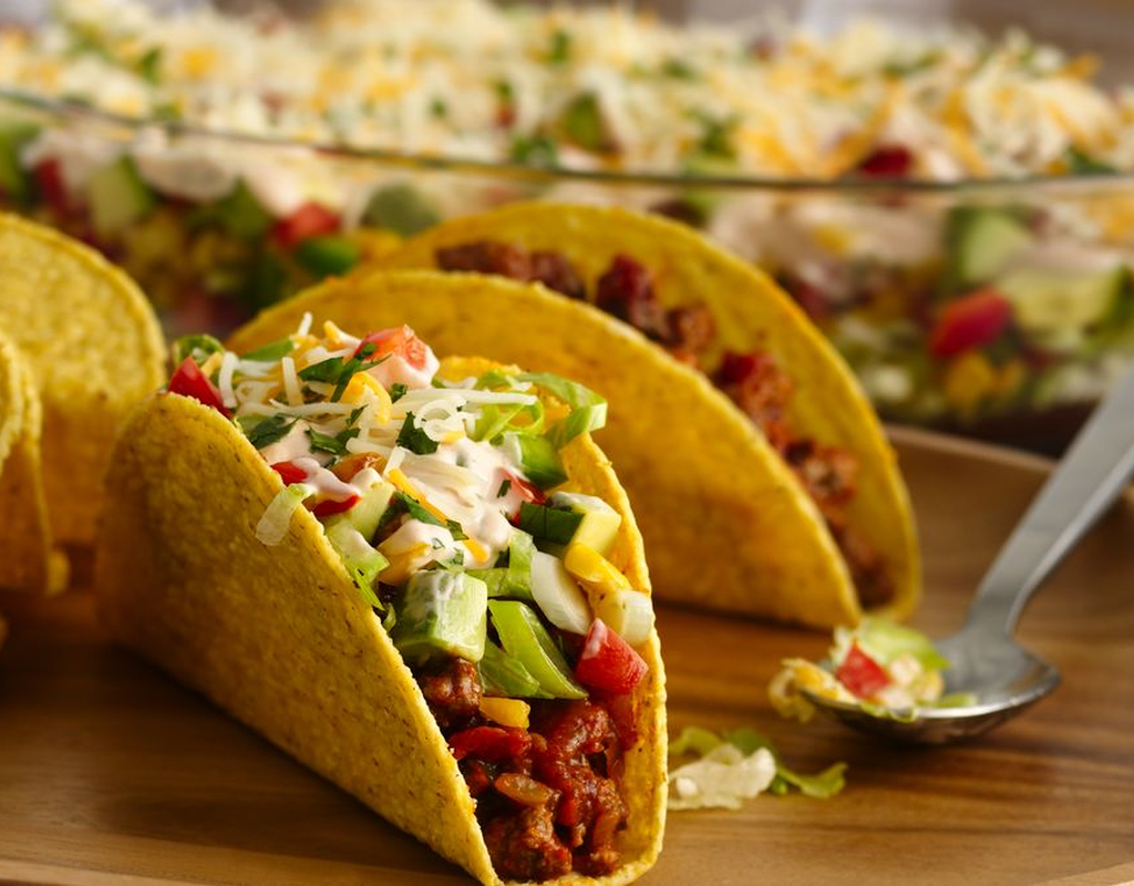 Beef stand n stuff taco with four bean salad
