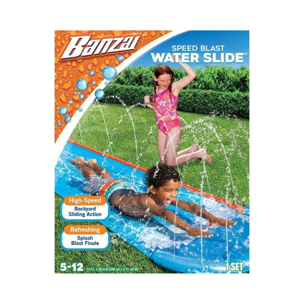 Child slides across a backyard waterslide, friend watching and cheering.
