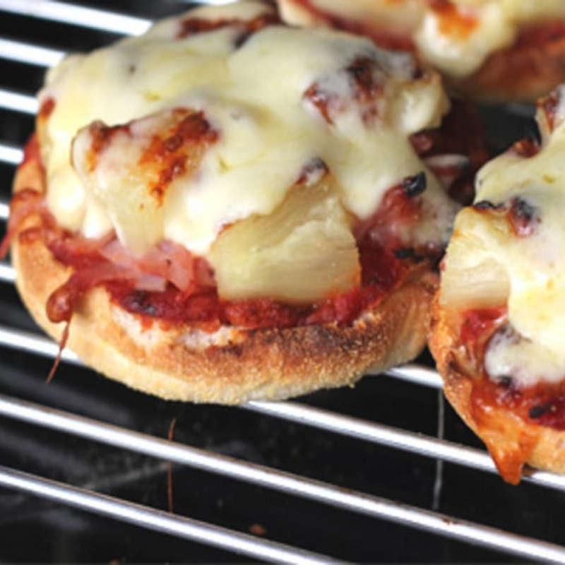 Ham and pineapple muffin pizzas