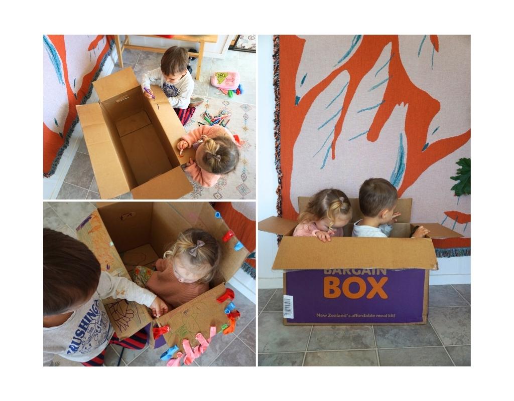 A collage of images showing two children playing in a cardboard box and colouring the outside.