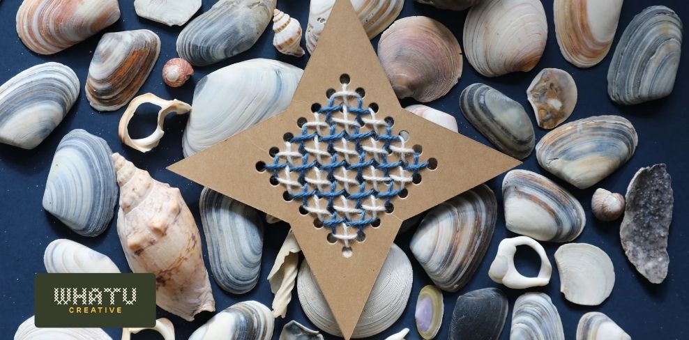 Whatu Creative, cardboard star with a woven yarn design. 