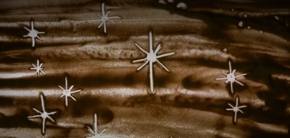 Stars drawn in the sand.