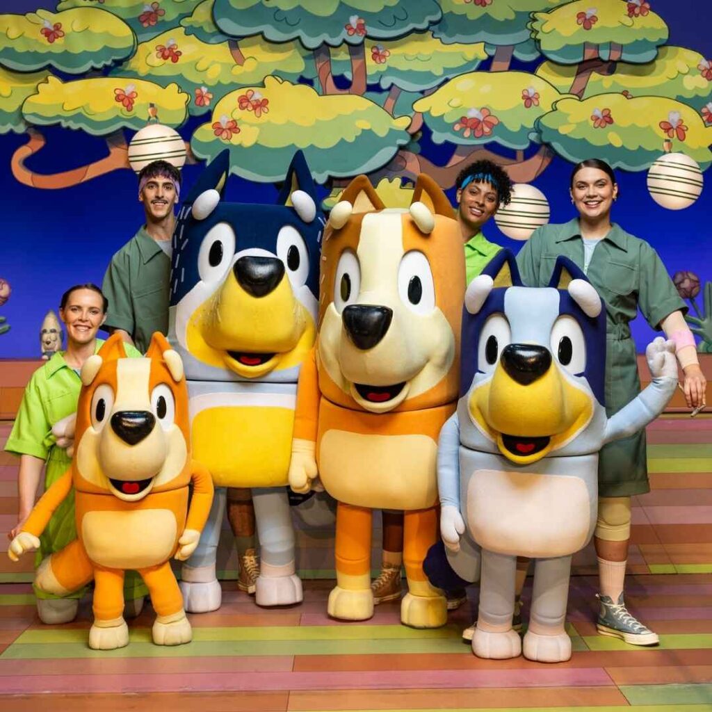 The cast of Bluey live onstage.